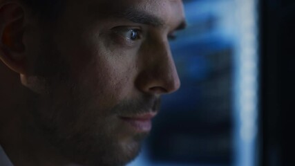 Poster - Confident Handsome Man Looks at Monitor Screen with Camera Moving to Computer Screen Showing Data, Infographics, Information, Statistics, Numbers. Businessman Working on Computer in the Office