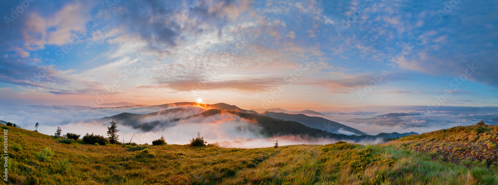 Panorama. Wonderful summer morning in the mountains. Sunrise over the mountains shrouded in fog. Carpathian mountains, Ukraine, Europe - obrazy, fototapety, plakaty 