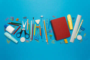 Back to school stationery set on blue background.