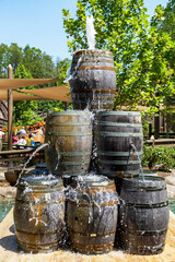 Wall Mural - barrel fountain at a shopping area in pigeon forge, tennessee