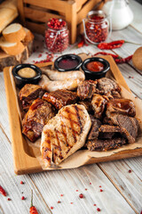 Wall Mural - Big meat plate chicken turkey sausage beef ribs
