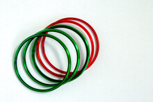Top View Side View Of Green Bangles And Red Bangles Isolated In White Background
