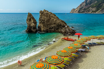 Wall Mural - A view over a secluded beach at Monterosso al Mare, Italy in summer