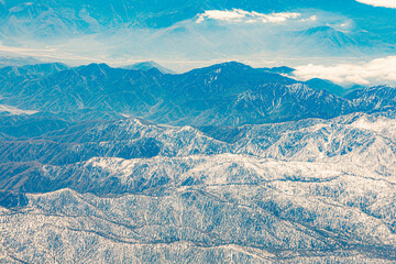  winter landscape in california with snow covered mountains near Landers,