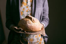 Girl Holding Fresh White Bread