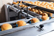 Bread packaging process on a conveyor belt