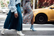 © Sween Shots/Stocksy - Women walking in the city