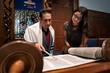 © Sean Locke Photography/Stocksy - Synagogue: Rabbi Practicing Torah Reading With Teen Girl
