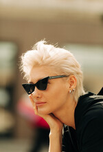 Street Portrait Of Beautiful Woman With Retro Sunglasses