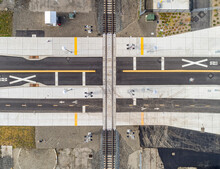 Aerial Drone Bird's Eye View Of A Railroad Crossing