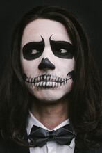 Portrait Of Young Man With Skull Halloween Facepaint