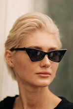 Closeup Of Beautiful Woman With Retro Sunglasses