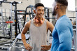 © Santi Nunez/Stocksy - Two attractive men training, building strength.