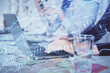 © peshkova - Multi exposure of woman hands typing on computer and forex chart hologram drawing. Stock market analysis concept.