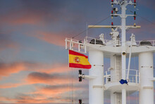 Spanish Flag On Ships Tower At Dusk