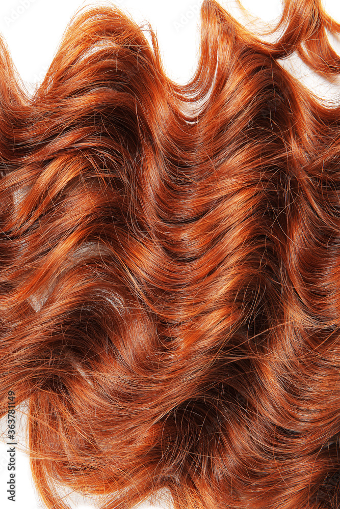 Curly red hair on white background