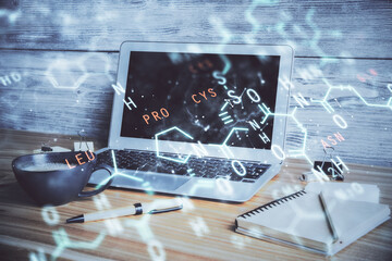 Desktop computer background and formula hologram writing. Double exposure. Education concept.