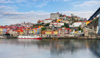 Wall Mural -  Porto at day with reflection in Douro river. Portugal