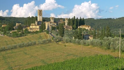 Wall Mural - Badia a Passignano, Florence, Italy - 2020, June 20: The ancient medieval village Badia a Passignano, with the historic Abbey of San Michele Arcangelo. Tuscan landscape.
