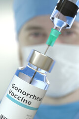 Wall Mural - Vial with gonorrhea vaccine and syringe against blurred doctor's face. 3D rendering