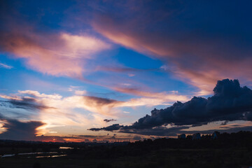 Blue pink sunset sky. Nature multicolored beautiful background.