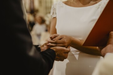 Canvas Print - Selective focus shot of a young bride and groom on their wedding day