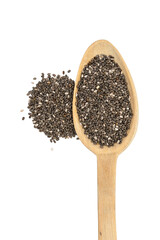 Wall Mural - Close up of chia seeds on a wooden spoon with a pile next to it seen directly from above and isolated on white background