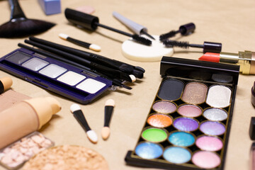 Wall Mural - Makeup products and accessories on make-up table. Side view, selective focus