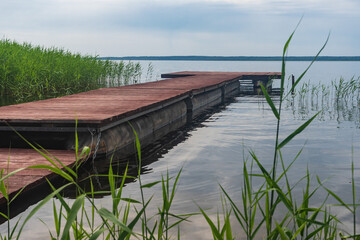 Wall Mural - Wooden pier on the lake in Braslav area, Belarus. 