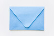 © Yulia Sanatina - classic blue envelope with round corners on the white background