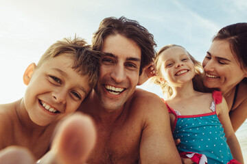 Wall Mural - Family selfie from cellphone viewpoint