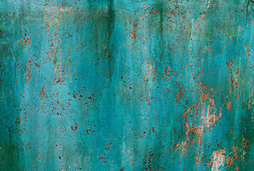 Turquoise cracked peeling rusty background.