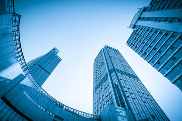 Leinwandbilder - Looking Up Blue Modern Office Building