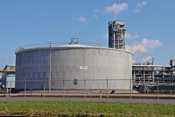 Wall Mural - Oil and chemical tanks at the terminal of Koole in the Botlek Harbor of Rotterdam.