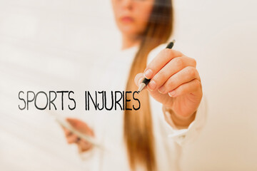 Word writing text Sports Injuries. Business photo showcasing injuries that occur when engaging in sports or exercise Model displaying different shots of holding pen ready for promotional use