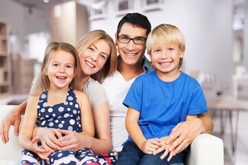 Canvas Print - Beautiful smiling lovely family at home