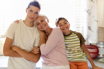 Wall Mural - Happy mother with her two sons
