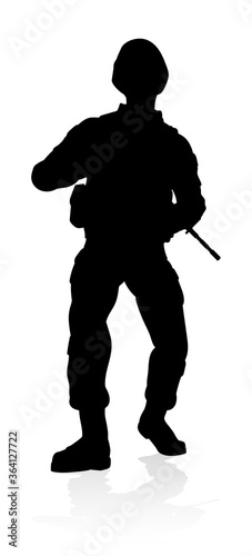 Silhouettes of a military a...