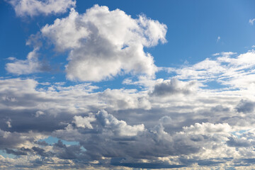 Aufkleber - many cumulus clouds on a blue sky