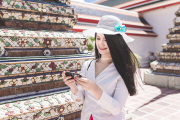 Journey girl in temple of thailand