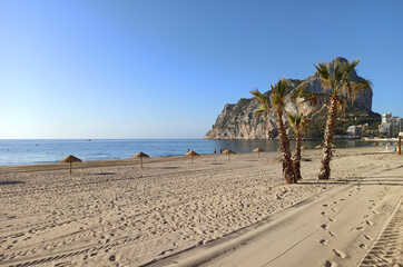 Empty beach Ifach mountain view. Calpe town. Spain