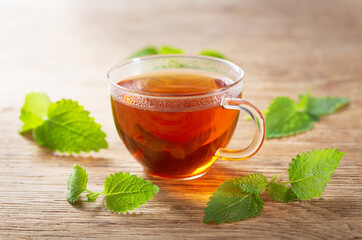 Wall Mural - cup of tea with mint leaves