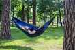 © Hennadii - Young guy has a rest in summer in a hammock