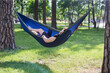 © Hennadii - Young guy has a rest in summer in a hammock