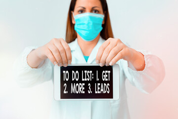 Fototapete - Text sign showing To Do List: 1. Get 2. More 3. Leads. Business photo text advertising plan to attract clients Laboratory technician featuring empty sticker paper accessories smartphone