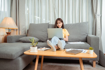 Young asian woman wearing working freelancer working at home concept.