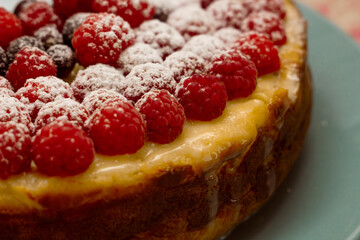 Homemade Cheesecake with Fresh Raspberries and Currants - Healthy Organic Summer Dessert Cheesecake Pie. Vanilla Cheese Cake with Wild Berry