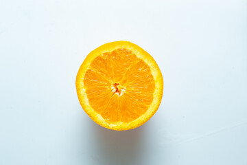 Wall Mural - Sliced fresh orange fruit on white background