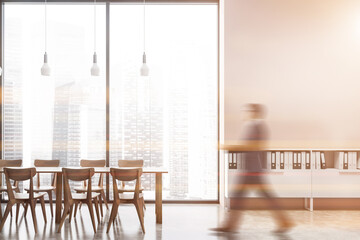 Canvas Print - Man walking in beige office cafe