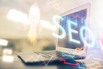 Poster - Double exposure of table with computer and seo drawing hologram. Search optimization concept.